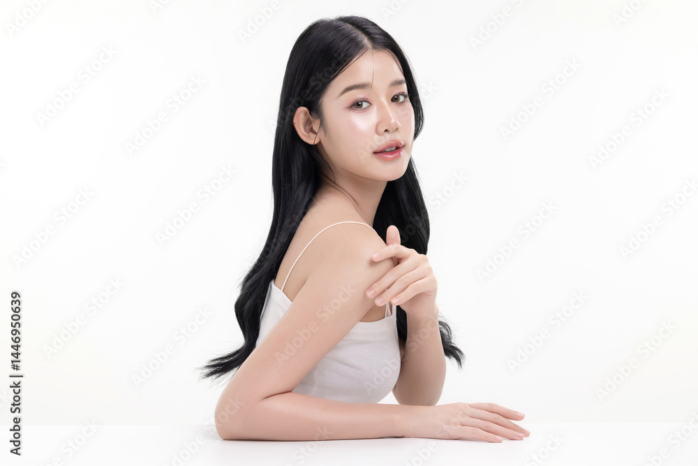 Glowing skin make up style of beautiful young Asian model isolated on white background. Glowing skin make up style of beautiful young Asian model isolated on white background.