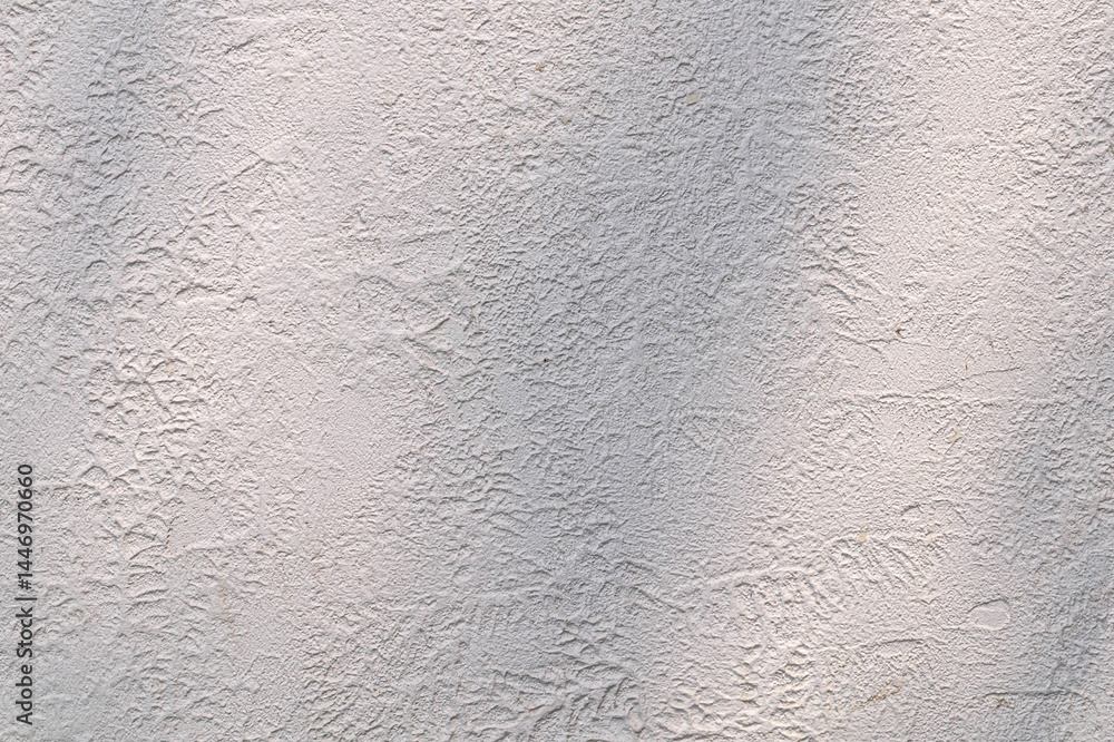 A close-up texture of a rough, light gray plaster wall with subtle patterns, showcasing a raw and natural surface with a slightly uneven finish A close-up texture of a rough, light gray plaster wall with subtle patterns, showcasing a raw and natural surface with a slightly uneven finish
