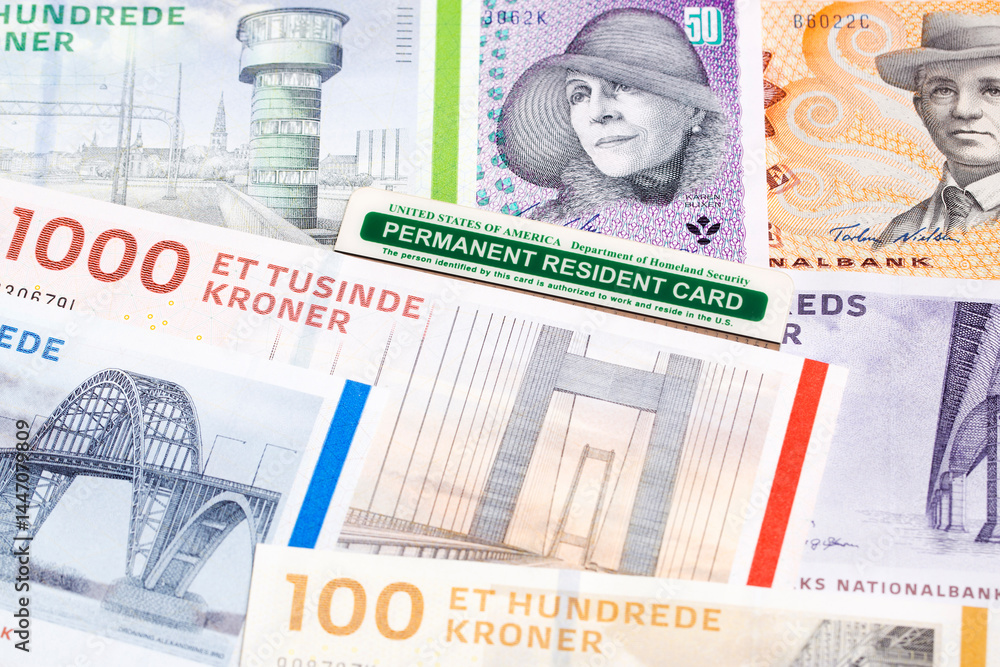 Fototapeta premium American permanent resident card on Danish money