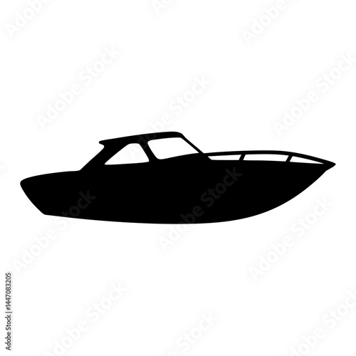 Silhouette of a motorboat with a cabin cruising on the water