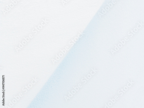 Obraz na płótnie Beautiful winter background with snowy ground. Natural snow texture. Wind sculpted patterns on snow surface. w salonie