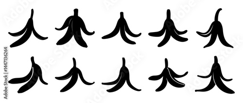 Silhouette of ten banana peels arranged in two rows on white background
