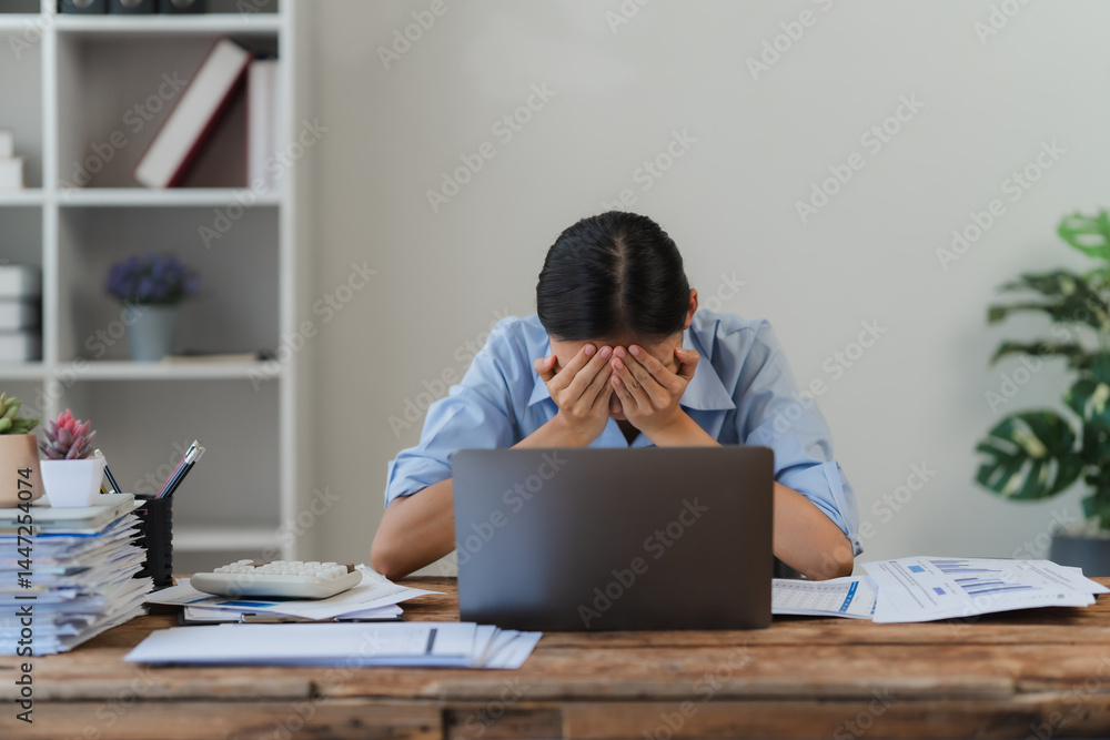 Stressed Woman at Desk with Laptop Stressed Woman at Desk with Laptop