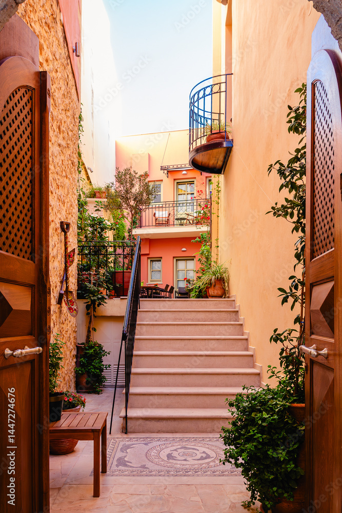 Charming alleyway with vibrant buildings and lush greenery