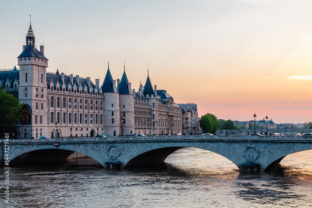 Conciergerie Castle and Bridge of Change over river Seine.