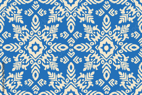 Ikat abstract background art. Ethnic tribal boho seamless wallpaper. Motif floral handmade seamless pattern block print batik vector ajrakh. Design for fashion, fabric, textile, wallpaper,wrapping