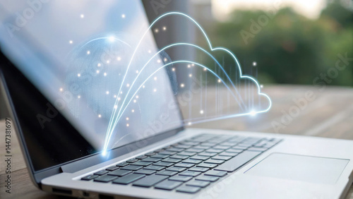 Laptop displaying cloud network connection with data syncing, symbolizing technology and innovation