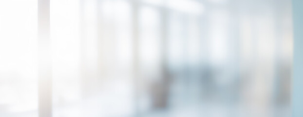 Abstract blurred background with light and neutral tones.