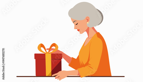 Joyful senior woman unwrapping gift at home, festive surprise