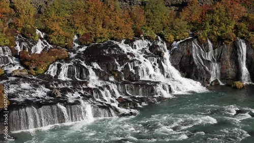 Hraunfossar waterfall flowing from lava rocks into the river, Iceland, Europe