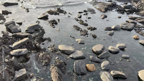 Rocky coastline at Saunders Rock in Sea Point, Cape Town.