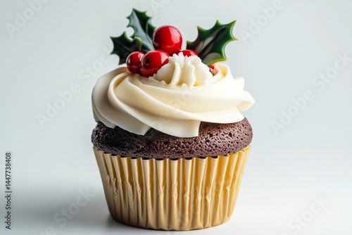 Delicious Chocolate Cupcake with Vanilla Frosting and Holly Berries
