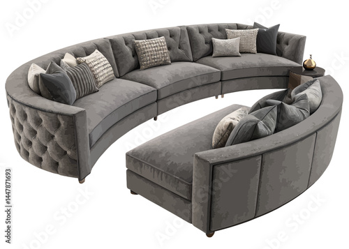 A luxurious gray curved sectional sofa with decorative pillows and a chaise lounge in a bright setting