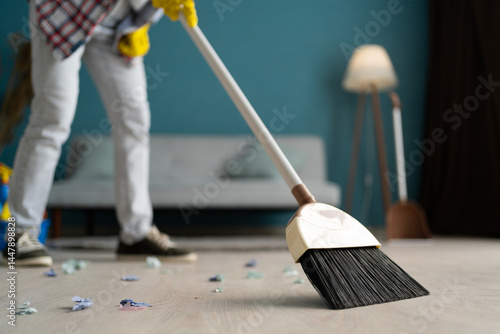 Wallpaper Mural Home cleaning concept. woman doing housework sweeping floor Torontodigital.ca