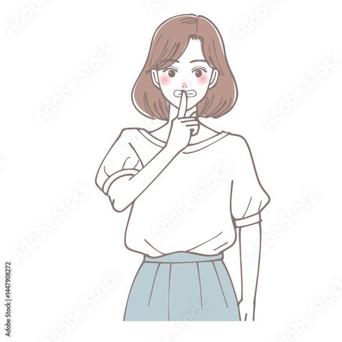 静かにのジェスチャーをしている女性