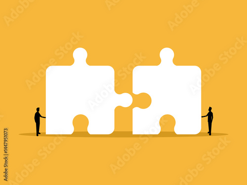 Make a connection, Two businessmen are solving puzzles