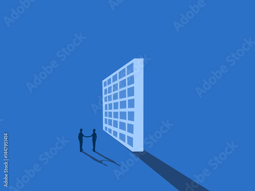 Two businessmen shake hands and agree to set up a tariff wall