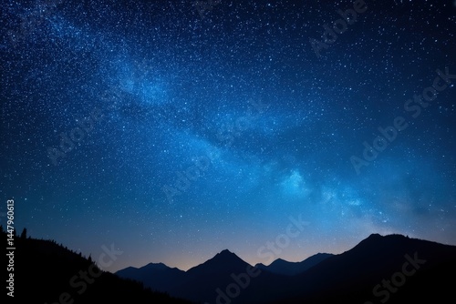 Wallpaper Mural A star-filled night sky over silhouetted mountains with the Milky Way visible above the horizon. Torontodigital.ca