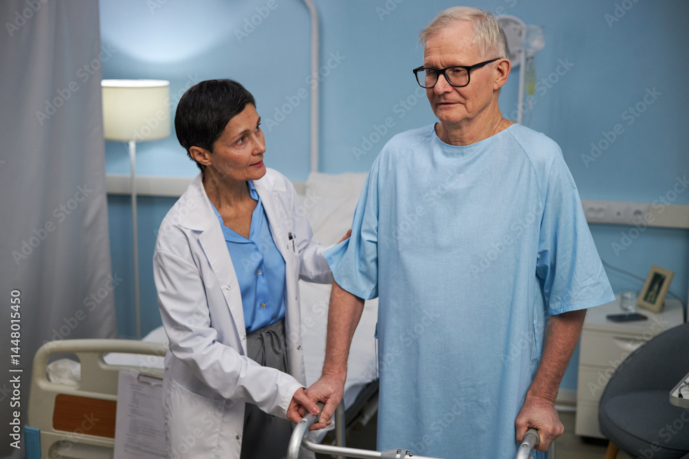 Obraz premium Female doctor assisting elderly patient with medical walker in hospital room. Scene depicting medical care and doctor-patient interaction
