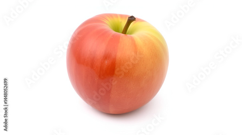 A single, red apple with a light yellow undertone sits on a white background.
