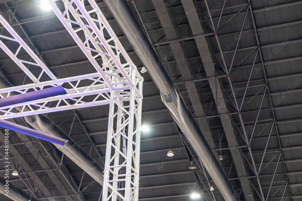 The large exhibition hall is highlighted by the building's roof structure and white steel frame. The large exhibition hall is highlighted by the building's roof structure and white steel frame.