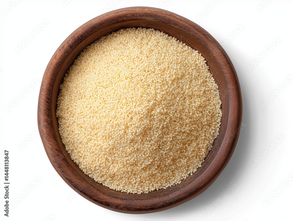Bulgur wheat in a wooden bowl, top view isolated on white with clipping path. Bulgur wheat in a wooden bowl, top view isolated on white with clipping path.