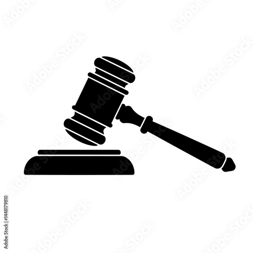 Courtroom Hammer: A symbol of justice, a courtroom hammer rests on its wooden block, ready to bring order and deliver decisions in the heart of legal proceedings.