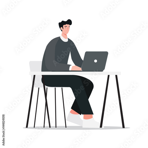 Focused individual working on a laptop at a stylish desk in a modern workspace during daylight hours