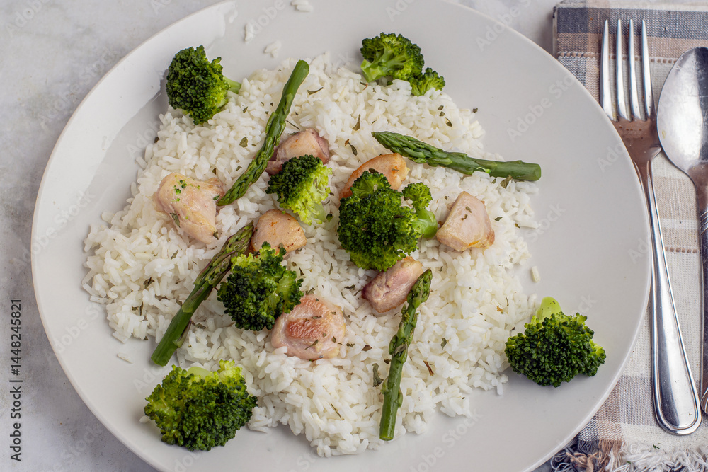 rice and chicken with broccoli , asparagus and parsley rice and chicken with broccoli , asparagus and parsley