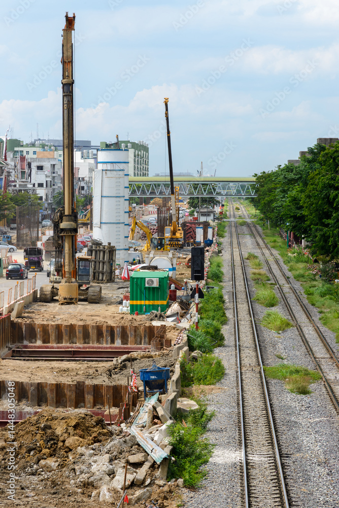 Bustling Elevated Railway Construction in Suburban Area.