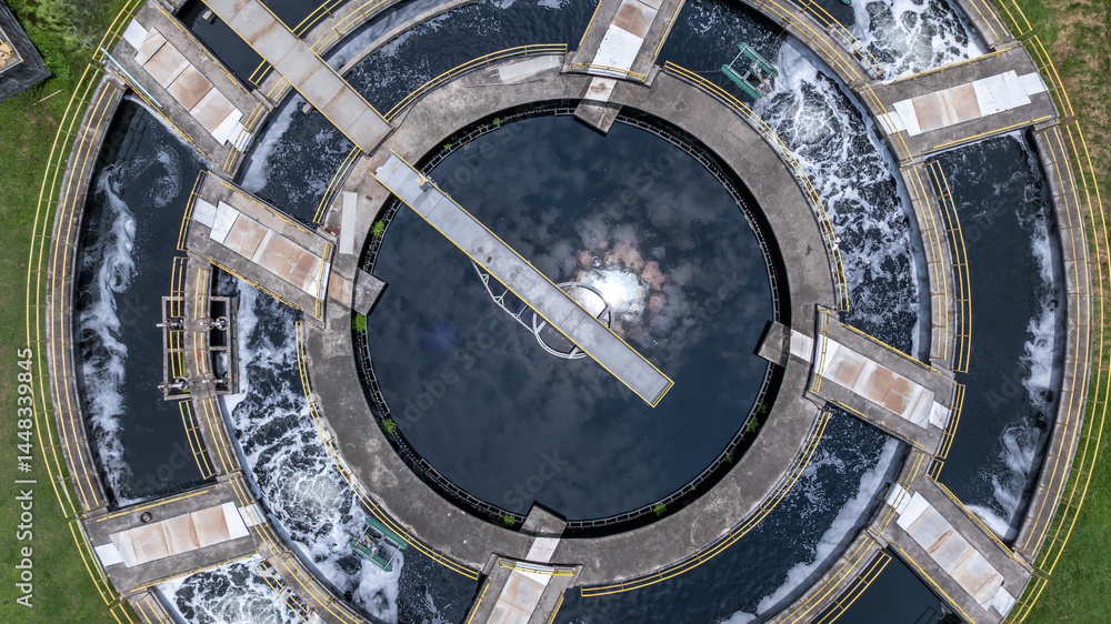Aerial view westewater treatment tank with wastewater, Circle circular water clarifier cleaning water, Circle water treatment plant circular clarifier, Water treatment plant.