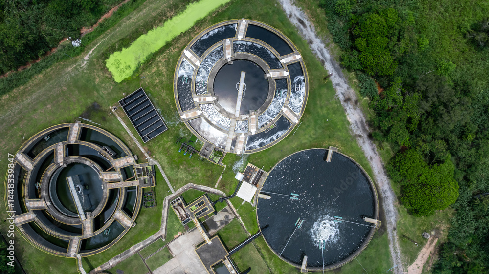 Aerial view westewater treatment tank with wastewater, Circle circular water clarifier cleaning water, Circle water treatment plant circular clarifier, Water treatment plant.