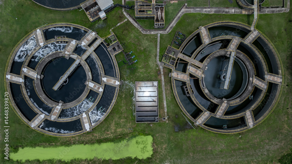 Aerial view westewater treatment tank with wastewater, Circle circular water clarifier cleaning water, Circle water treatment plant circular clarifier, Water treatment plant.