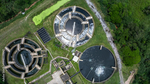 Obraz na płótnie Aerial view westewater treatment tank with wastewater, Circle circular water clarifier cleaning water, Circle water treatment plant circular clarifier, Water treatment plant. w salonie
