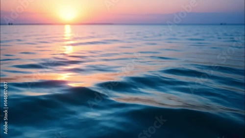 Video of fantastic sunset over sea with sun descending below horizon