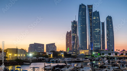 Al Bateen marina Abu Dhabi day to night timelapse with modern skyscrapers on background