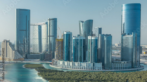 Buildings on Al Reem island in Abu Dhabi timelapse from above.