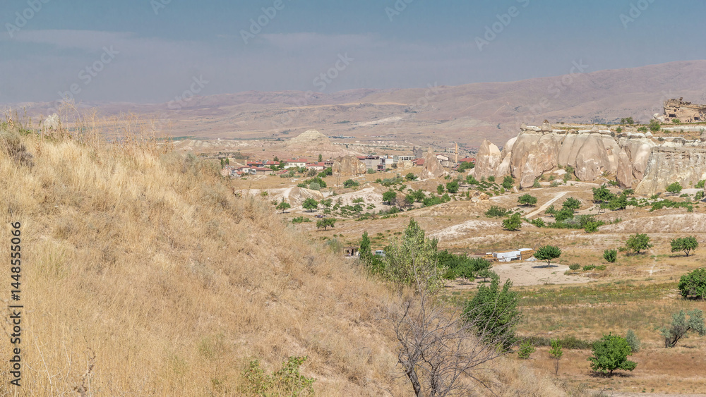 Fototapeta premium Red Valley and Rose Valley of Goreme of Nevsehir in Cappadocia aerial timelapse, Turkey.