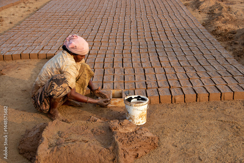 Photos Woman Making Handmade Clay Bricks at a Brick Kiln in Rural India