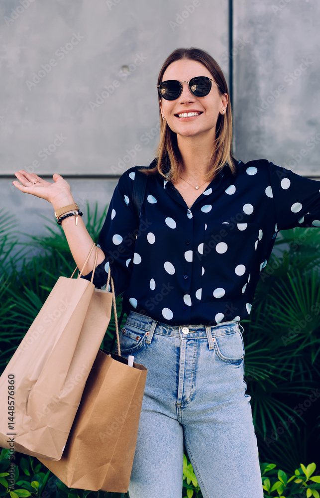 Cheerful woman taking selfie looking away