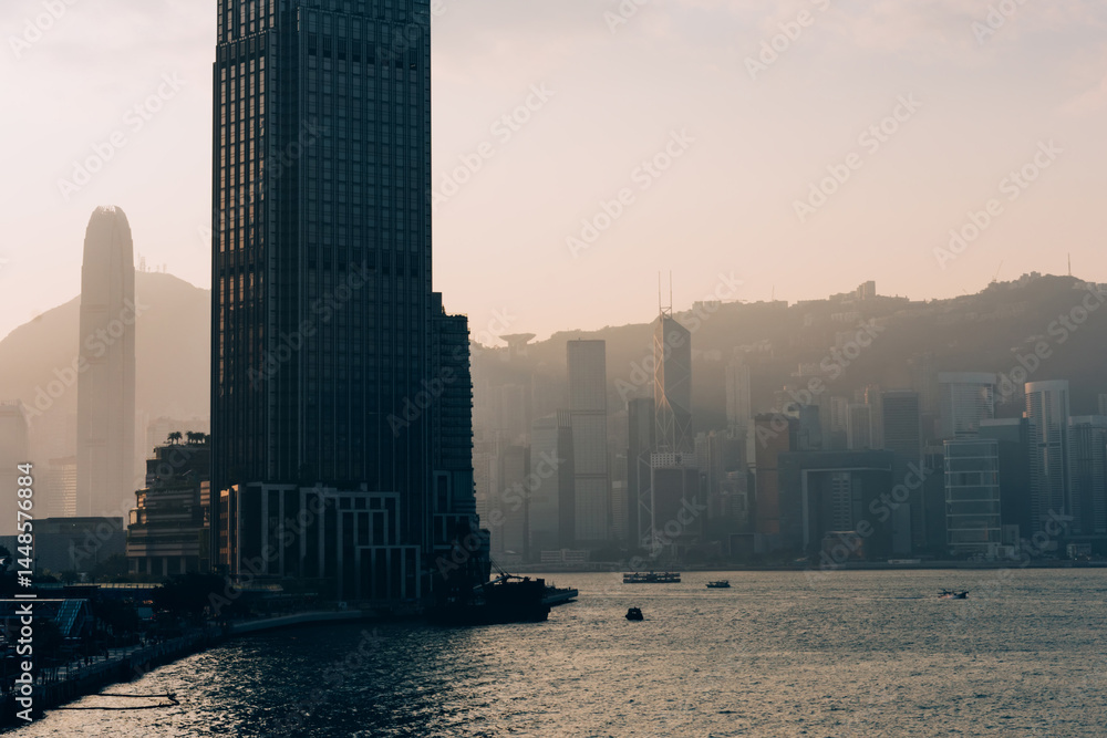 Contemporary city with channel and mountains