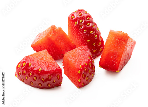 Cut strawberry pieces isolated on white. Chopped strawberry close up, studio shot no AI.
