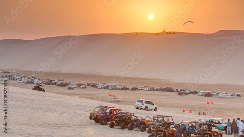 Canvas Print Buggies in sand desert at the sunset timelapse