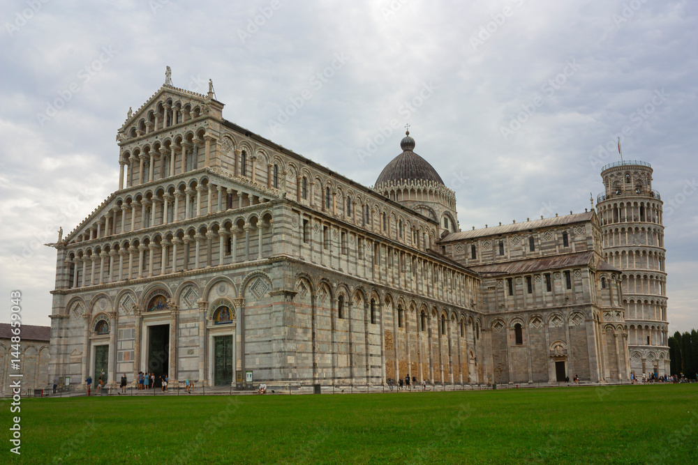View of the cathedral of Pisa on a cloudy day View of the cathedral of Pisa on a cloudy day