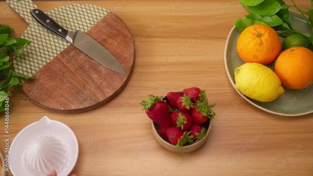 Top-Down Tracking Shot of Fresh Citrus and Strawberry on Wooden Table Top-Down Tracking Shot of Fresh Citrus and Strawberry on Wooden Table
