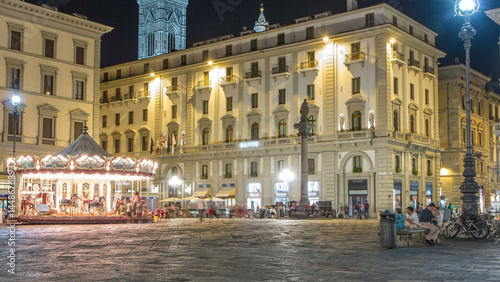 Fototapeta Naklejka Na Ścianę i Meble -  Tourists walk in Piazza della Repubblica timelapse, one of the main city squares in Florence.