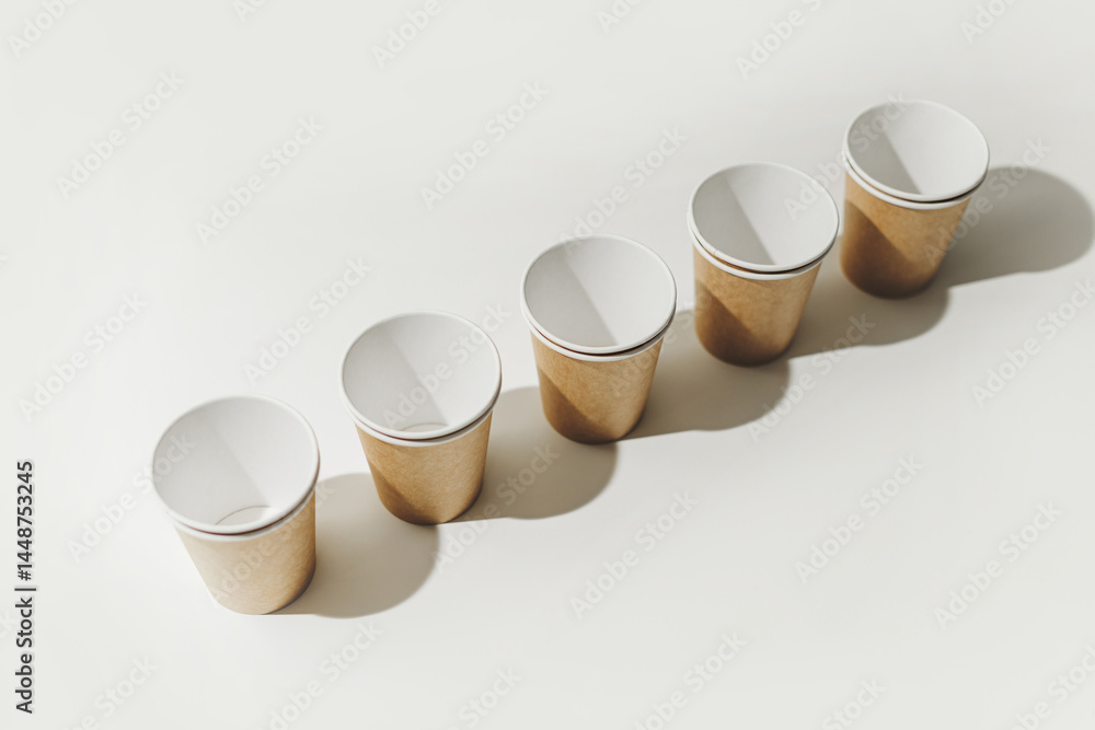 Many Recyclable Cardboard Disposable Cups on White.