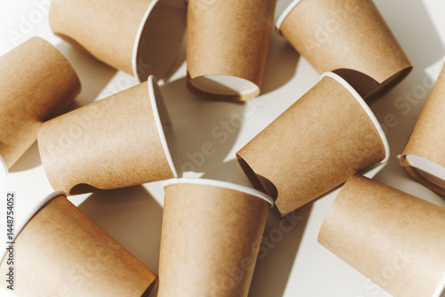 Many Recyclable Cardboard Disposable Cups on White.