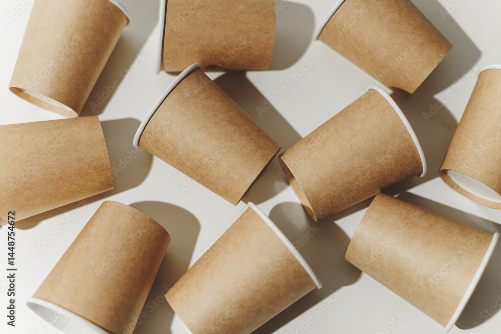 Many Recyclable Cardboard Disposable Cups on White.