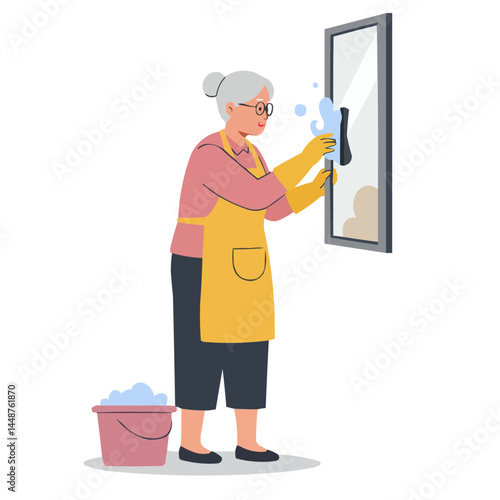 Elderly woman washing windows - caring senior lady cleaning windows in sunlight, her focused face reflecting diligence and cozy domesticity of spring cleaning.
